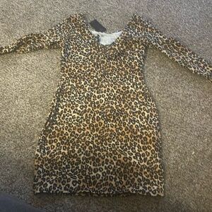 Women’s leopard Guess bodycon dress 
Great for a night out